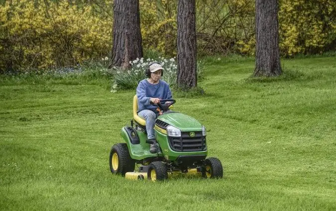 using an powered mower safely with ear muffs