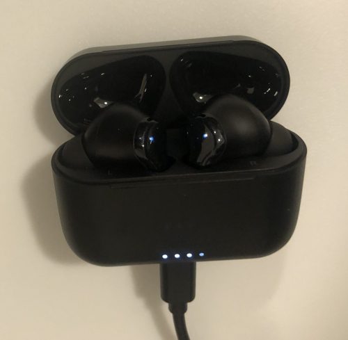 TOZO NC2 earbuds and case plugged in and charging up