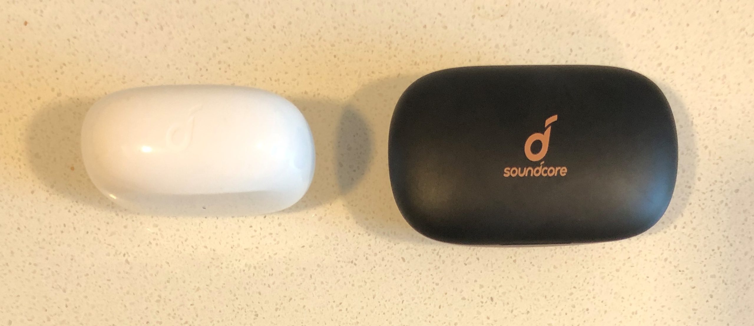 Soundcore Life P2i vs P2 charging and carrying case top view