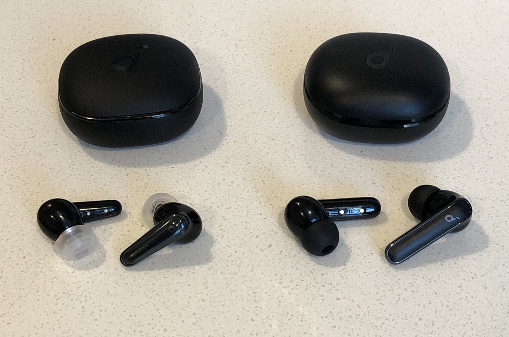 Soundcore Liberty 4 vs Life P3 wireless earbuds and charging case